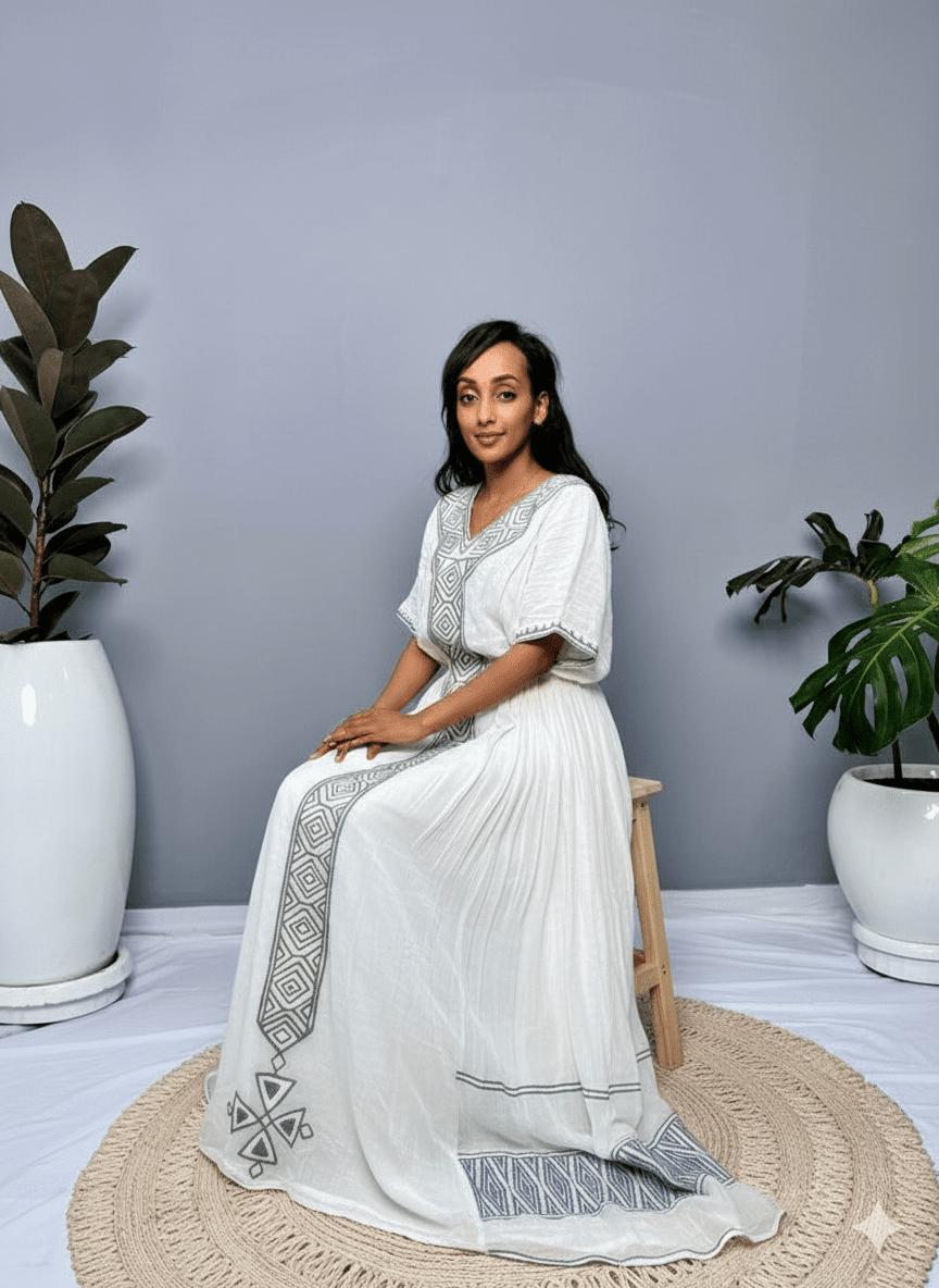 Traditional Ethiopian Habesha Kemis with Grey - Blue Tillet Embroidery | ETH_Wm - 0003Kaba GebeyaKaba StoreXSAll agesTraditional Ethiopian Habesha Kemis with Grey - Blue Tillet Embroidery | ETH_Wm - 0003