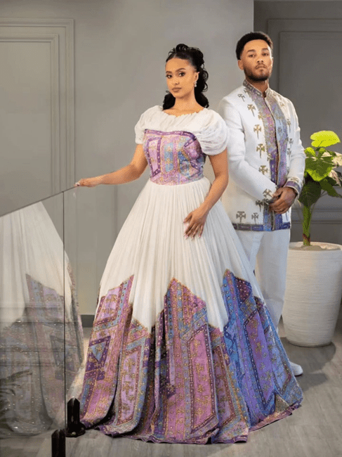 Lavender & Gold Elegance: Modern Ethiopian Couple's Wedding Attire | ETH_Cp - 0003CouplesKaba StoreKaba StoreAny ColorXSAll agesLavender & Gold Elegance: Modern Ethiopian Couple's Wedding Attire | ETH_Cp - 0003