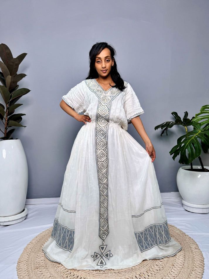 Traditional Ethiopian Habesha Kemis with Grey - Blue Tillet Embroidery | ETH_Wm - 0003Kaba GebeyaKaba StoreXSAll agesTraditional Ethiopian Habesha Kemis with Grey - Blue Tillet Embroidery | ETH_Wm - 0003