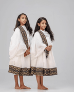 Little Angels: Coordinated Habesha Kemis Dresses for Girls | ETH_Kid - 0001Children 0–14 yrKaba StoreKaba StoreKids1 - 2Little Angels: Coordinated Habesha Kemis Dresses for Girls | ETH_Kid - 0001