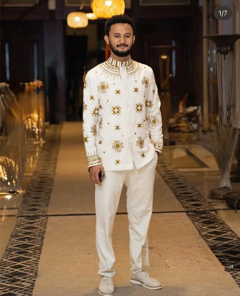 Regal Ethiopian Prince: Traditional Men's White & Gold Embroidered Suit | ETH_M - 0001Men's Wear Kaba StoreKaba StoreXSEthiopian Traditional Men's White & Gold Embroidered Suit Ethiopian clothing Habesha clothing 