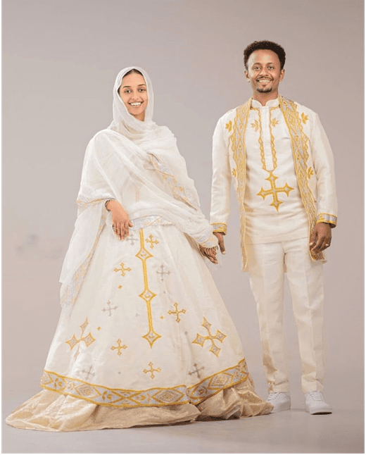 Radiant Union: Bespoke Ethiopian Wedding Attire in Orange & Gold Tilet | Couples Matching | ETH_W - 0001Wedding WearKaba StoreKaba StoreRadiant Union: Bespoke Ethiopian Wedding Attire in Orange & Gold Tilet | Couples Matching | ETH_W - 0001