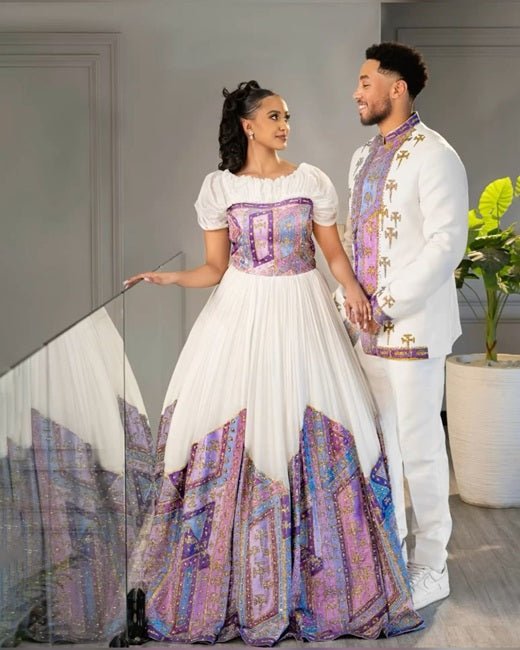 Lavender & Gold Elegance: Modern Ethiopian Couple's Wedding Attire | ETH_Cp - 0003CouplesKaba StoreKaba StoreAny ColorXSAll agesModern Ethiopian Couple's Wedding Attire Ethiopian traditional clothes Habesha Kemis Ethiopian dress Habesha dress Ethiopian Men's Suit Habesha Suit Ethiopian clothing Habesha clothing 
