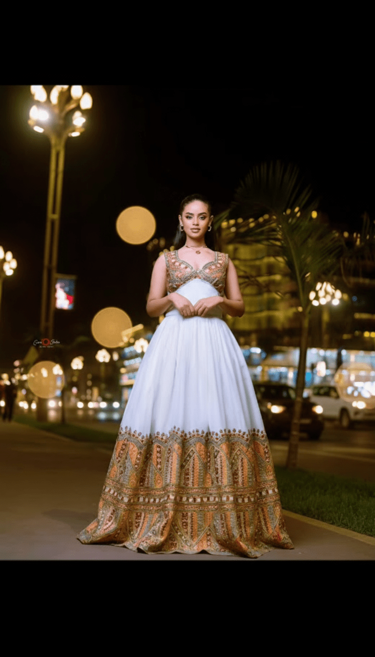 Luxury Habesha Kemis – Contemporary Sleeveless Evening Gown with Bronze & Gold T'el'e't Embroidery | ETH_W - 0007Women'sKaba StoreKaba Store1XSAll agesCustomizableLuxury Habesha Kemis – Contemporary Sleeveless Evening Gown with Bronze & Gold T'el'e't Embroidery | ETH_W - 0007