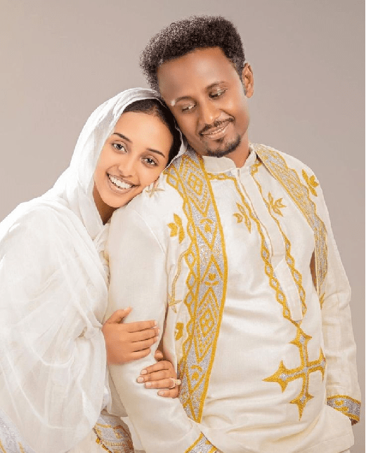 Radiant Union: Bespoke Ethiopian Wedding Attire in Orange & Gold Tilet | Couples Matching | ETH_W - 0001Wedding WearKaba StoreKaba StoreRadiant Union: Bespoke Ethiopian Wedding Attire in Orange & Gold Tilet | Couples Matching | ETH_W - 0001