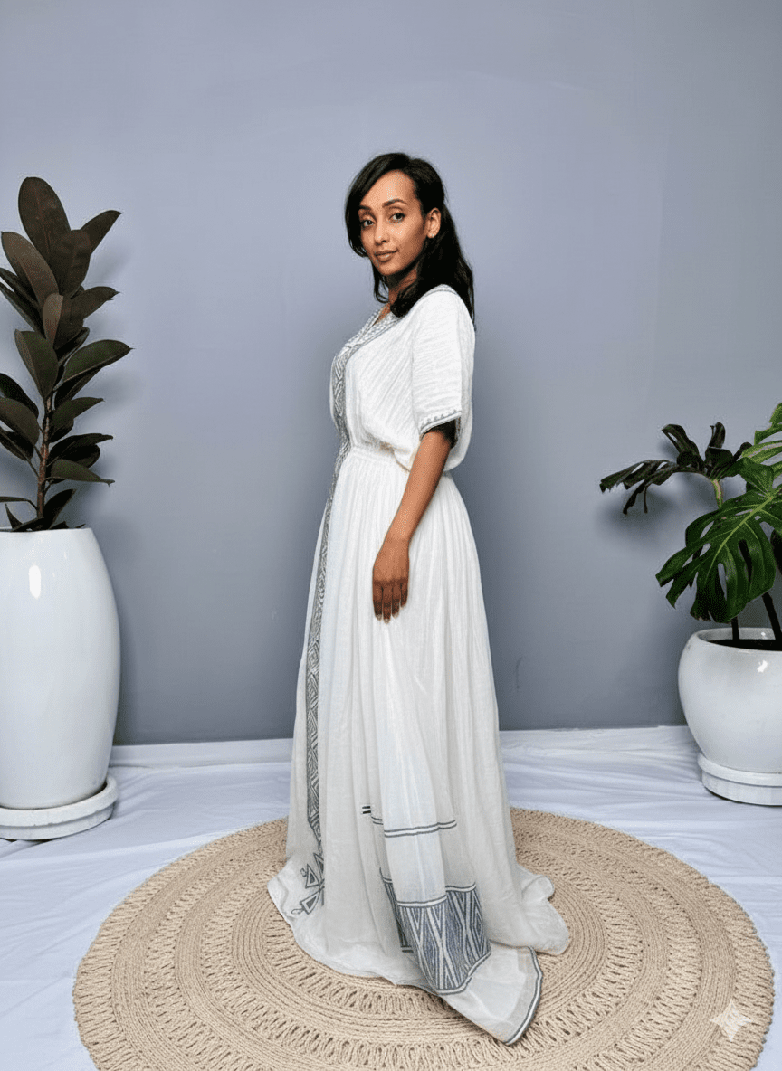 Traditional Ethiopian Habesha Kemis with Grey - Blue Tillet Embroidery | ETH_Wm - 0003Kaba GebeyaKaba StoreXSAll agesTraditional Ethiopian Habesha Kemis with Grey - Blue Tillet Embroidery | ETH_Wm - 0003