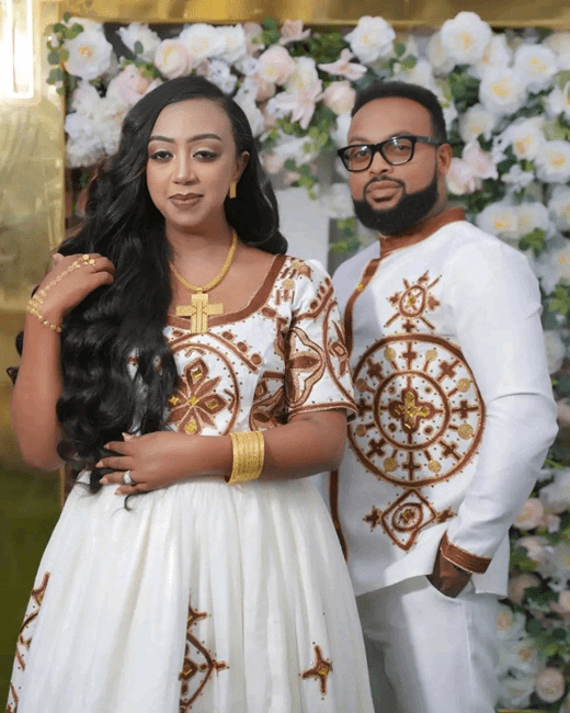 🌟 Regal Ethiopian Couple's Attire – Elegant White &amp; Brown/Gold Traditional Ensemble for Weddings &amp; Formal Events | ETH_Cp - 0005CouplesKaba StoreKaba StoreAny ColorXSAll ages🌟 Regal Ethiopian Couple's Attire – Elegant White &amp; Brown/Gold Traditional Ensemble for Weddings &amp; Formal Events | ETH_Cp - 0005