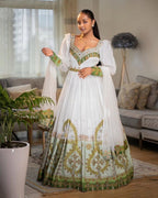 Emerald Elegance: White Ethiopian Habesha Kemis with Green & Gold Tillet Embroidery | ETH_Wm - 0001Women'sKaba StoreKaba StoreXSAll agesWoman in a white and green embroidered traditional outfit. Ethiopian wedding Habesha brides  Ethiopian Embroidery Colors Tilet for Epiphany/Baptism Tilet Color Occasion Kaba Store Products Kaba Store Heritage Tilet Color Meaning Habesha Tilet Guide Habesha Style Gallery Habesha Kemi Symbolism Habesha Embroidery Motifs Ethiopian Wedding Style Ethiopian Wedding Co