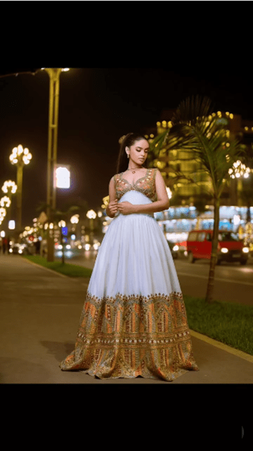 Luxury Habesha Kemis – Contemporary Sleeveless Evening Gown with Bronze & Gold T'el'e't Embroidery | ETH_W - 0007Women'sKaba StoreKaba Store1XSAll agesCustomizableLuxury Habesha Kemis – Contemporary Sleeveless Evening Gown with Bronze & Gold T'el'e't Embroidery | ETH_W - 0007
