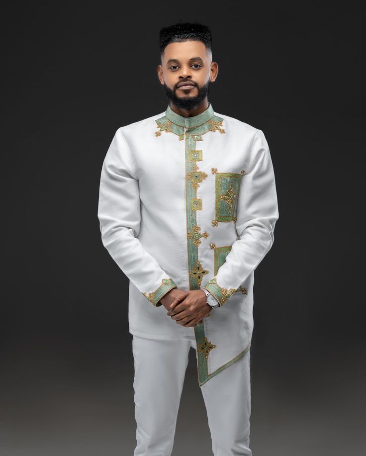 Modern Ethiopian Elegance: Men's White Suit with Teal & Gold Tillet | ETH_M - 0003Men's WearKaba StoreKaba StoreETH_M-0003XSCustomizableModern Ethiopian Elegance: Men's White Suit with Teal & Gold Tillet | ETH_M - 0003