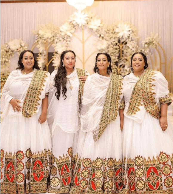 🌟 Grand Habesha Kemis Ensemble – Traditional Ethiopian White Cotton Dresses with Red &amp; Gold T'el'e't Embroidery for Celebrations | ETH - GM - 0005Group MatchingKaba StoreKaba StoreXSCustomizable🌟 Grand Habesha Kemis Ensemble – Traditional Ethiopian White Cotton Dresses with Red &amp; Gold T'el'e't Embroidery for Celebrations | ETH - GM - 0005