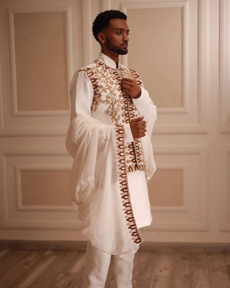 Modern Ethiopian Elegance: Men's White Suit with Teal & Gold Tillet | ETH_M - 0005Men's WearKaba StoreKaba StoreM-0005XSCustomizableModern Ethiopian Elegance: Men's White Suit with Teal & Gold Tillet | ETH_M - 0005